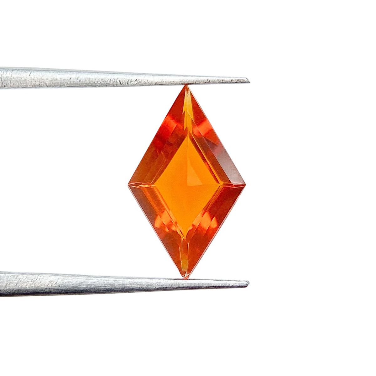 0.56ct | Lozenge Shape Step Cut Fire Opal-Modern Rustic Diamond