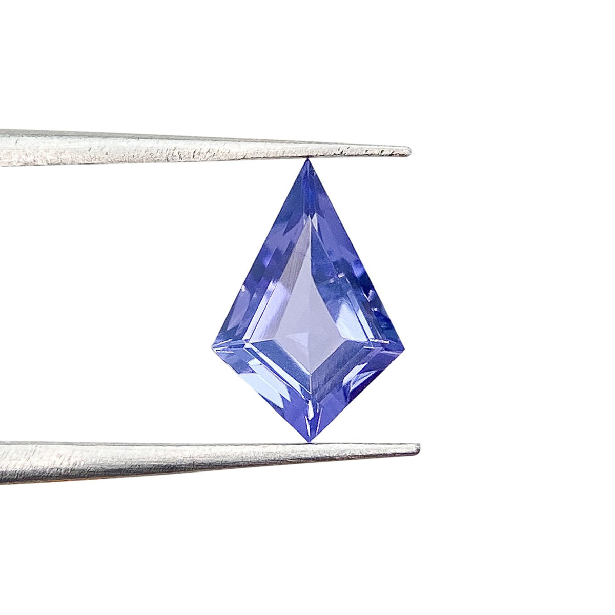 0.64ct | Kite Shape Step Cut Tanzanite-Modern Rustic Diamond