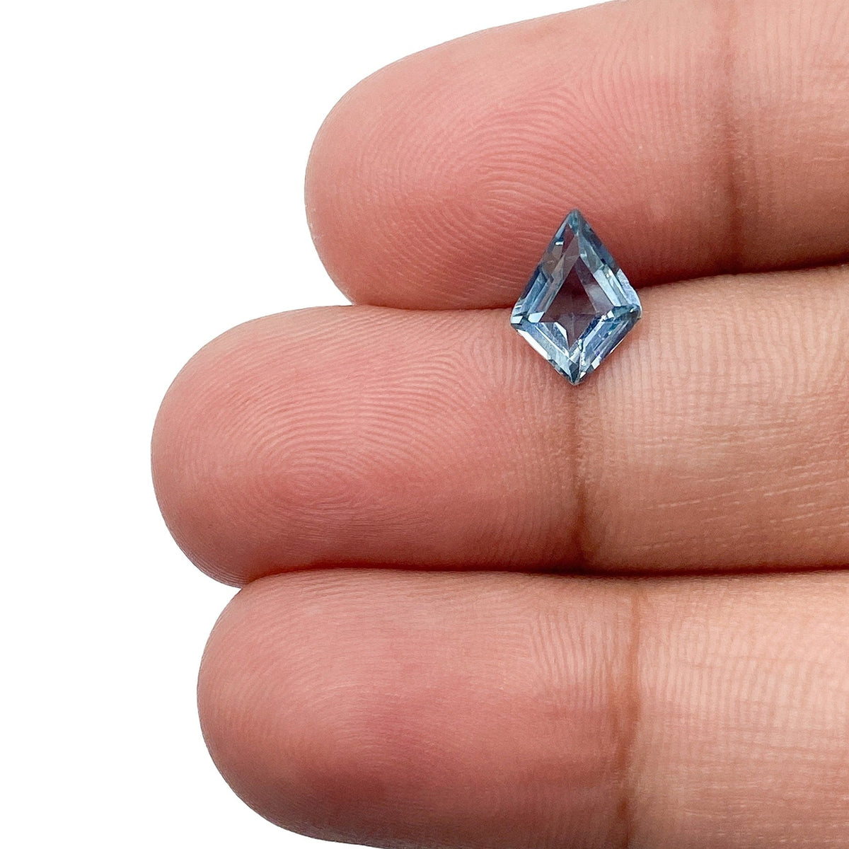 0.88ct | Step Cut Kite Shape Light Blue Montana Sapphire-Modern Rustic Diamond