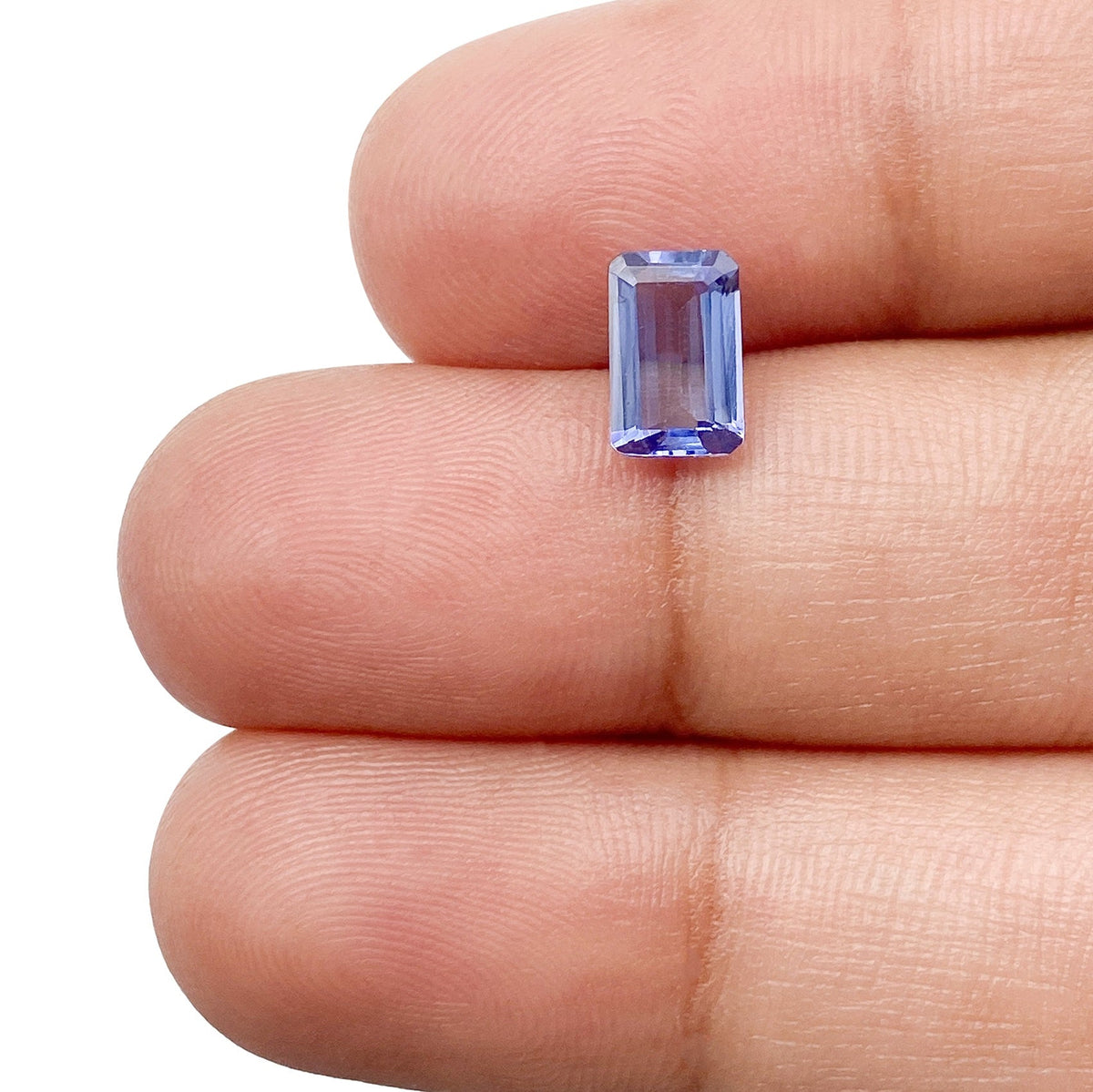 0.97ct | Emerald Shape Step Cut Tanzanite-Modern Rustic Diamond