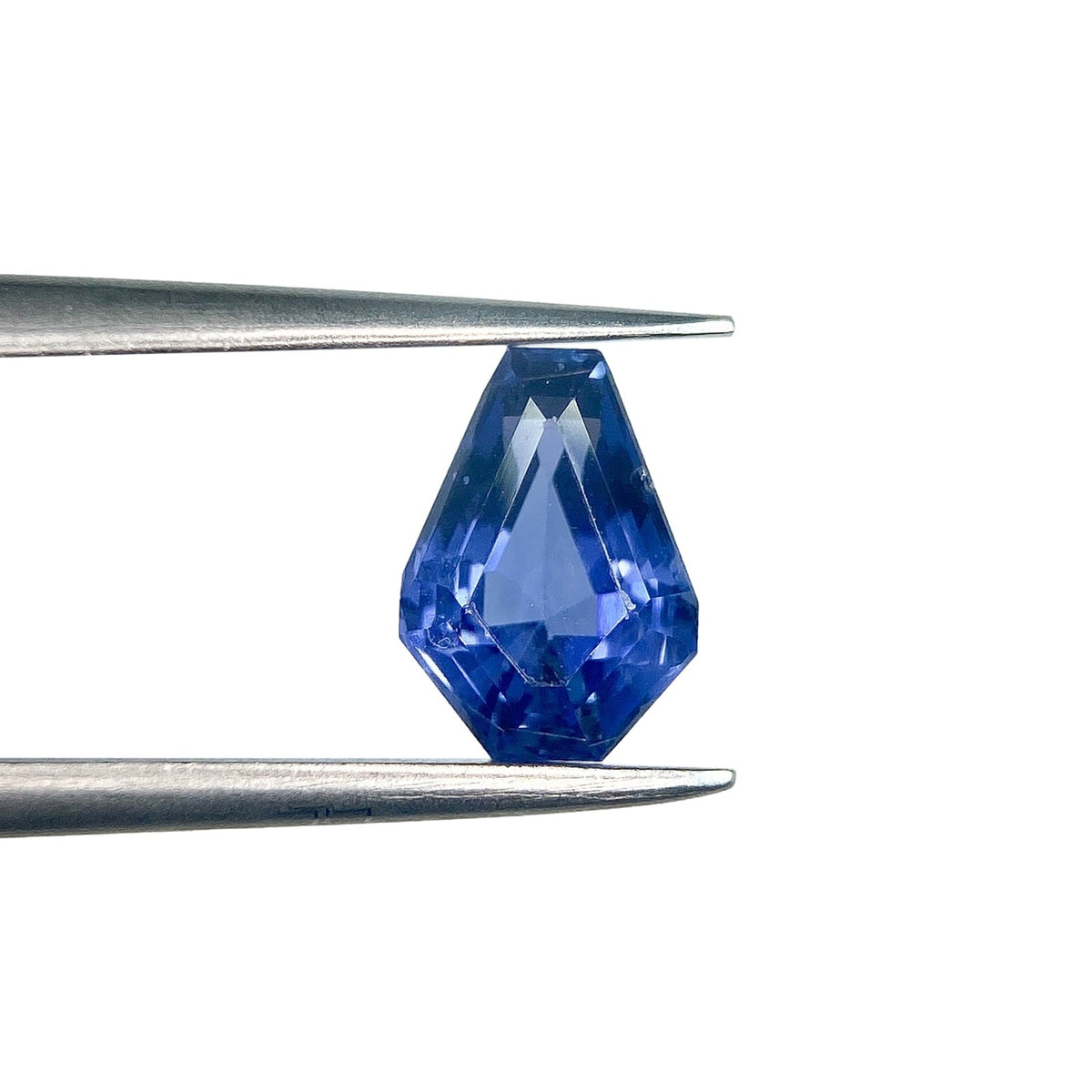 1.50ct | Step Cut Shield Shape Blue Sapphire-Modern Rustic Diamond