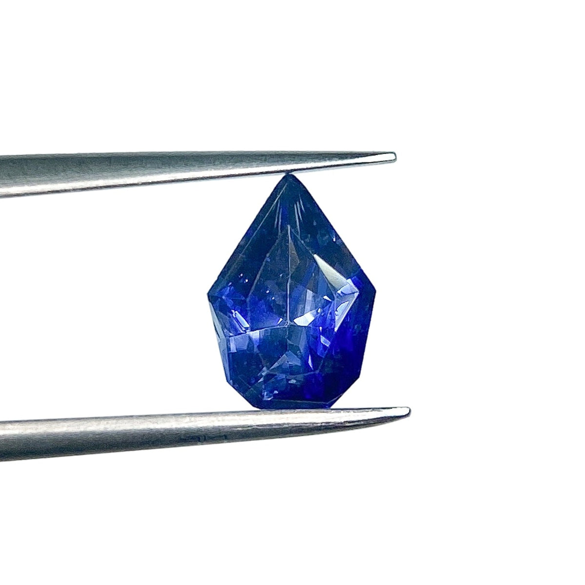 1.67ct | Step Cut Shield Shape Blue Sapphire-Modern Rustic Diamond