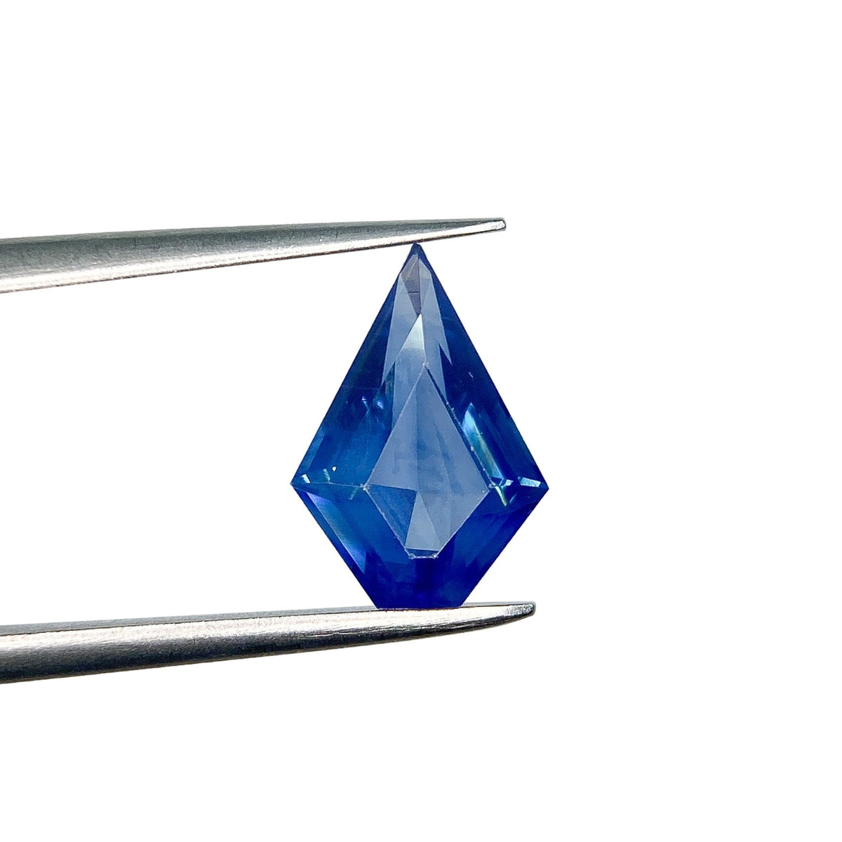 2.10ct | Step Cut Shield Shape Blue Sapphire-Modern Rustic Diamond